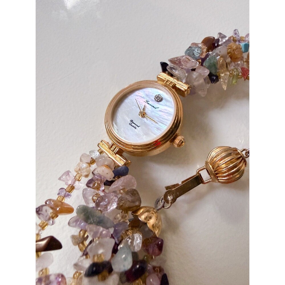 Lucoral watch bracelet with pearlized face and beautiful multi-color stone band